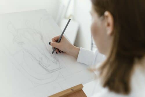 young-woman-drawing-canvas